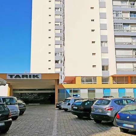 Tarik بورتيماو